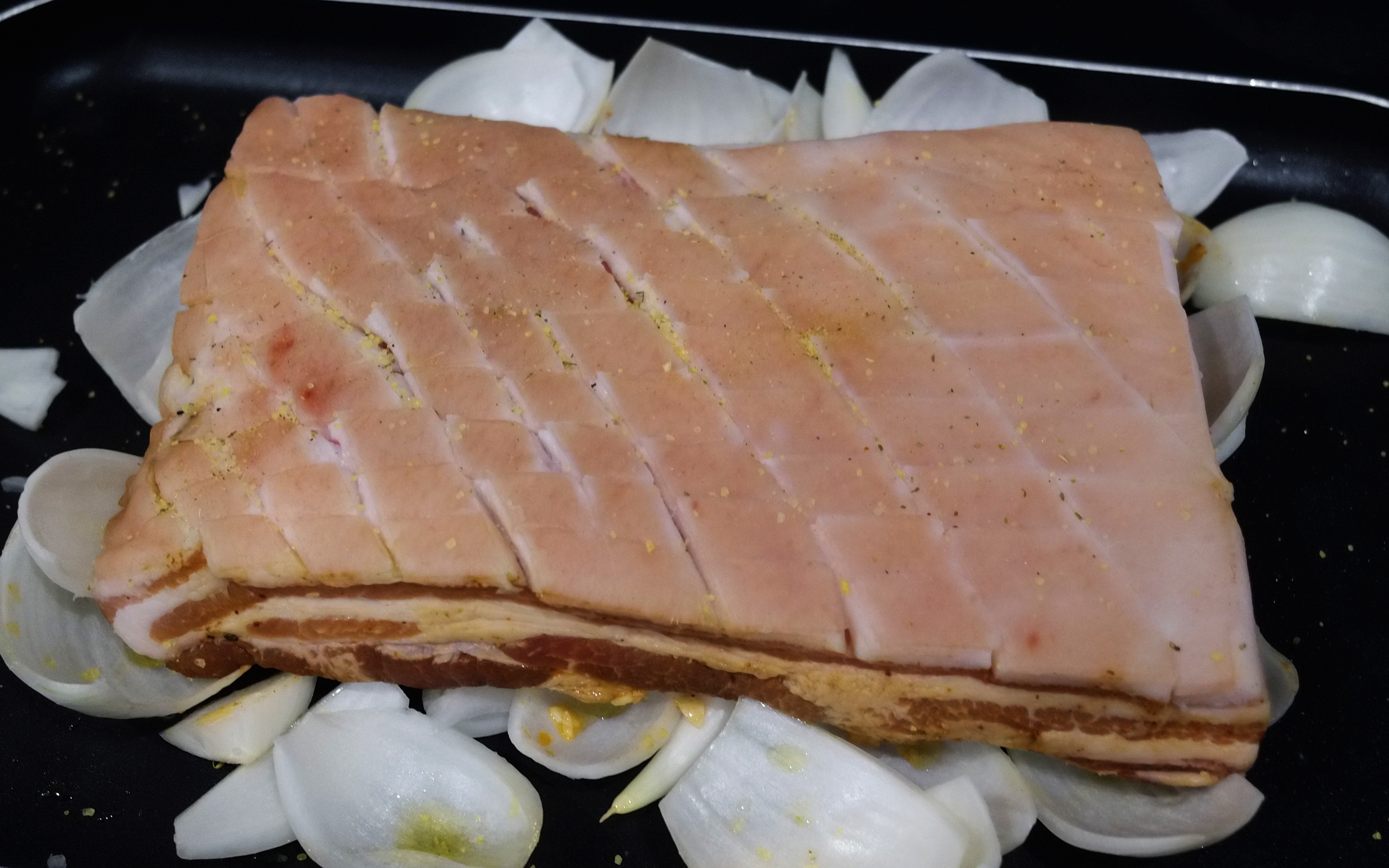 Marianted and dried out pork belly ready for the oven
